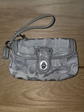 Coach Silver Signature Turnlock Wristlet